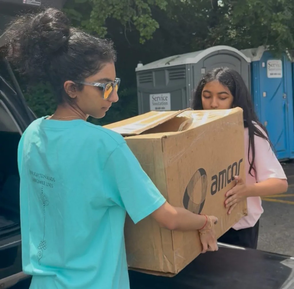 Empower Eats volunteers delivering rescued meals
